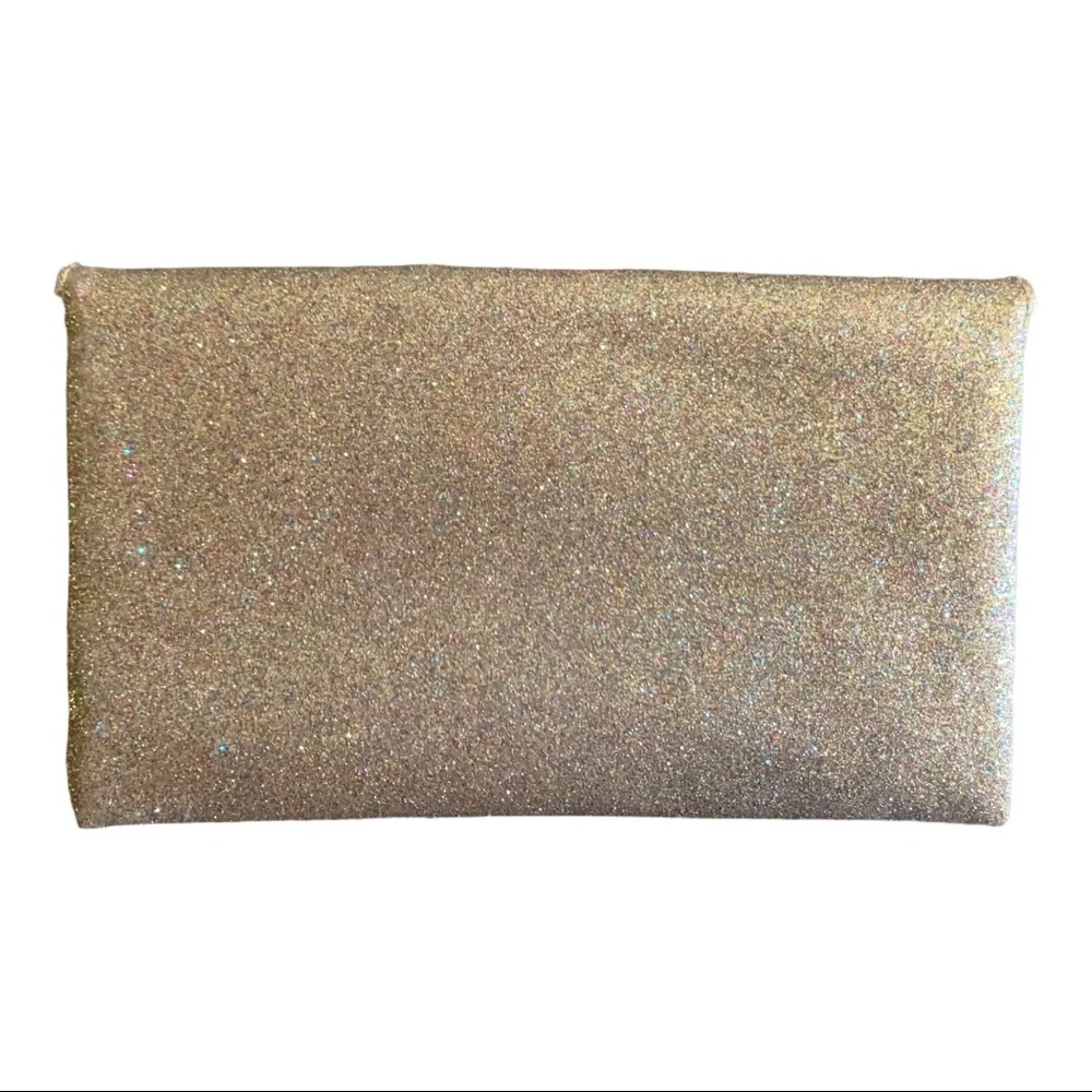 Anthropologie miss Albright hood clutch